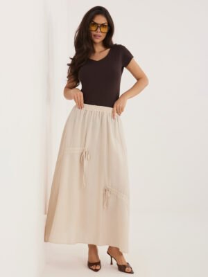 Lengvai krintantis ilgas sijonas su dekoratyviais raišteliais "NOELLY" smėlio