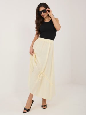 Lengvai krintantis ilgas sijonas su dekoratyviais raišteliais "NOELLY" šviesi geltona